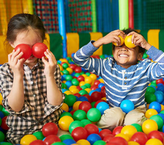 Children playing in ball pit