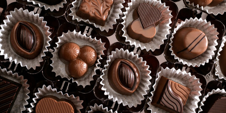 Box of a variety of chocolate truffles and squares