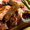 Ribs covered in barbecue sauce