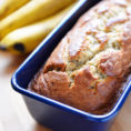 Baked banana bread in blue loaf pan