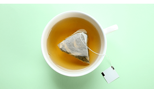 Cup of tea with teabag in liquid Cup of tea with teabag in liquid