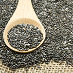 Chia seeds with a spoon resting on them