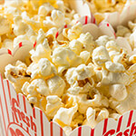 Closeup of popcorn in striped boxes