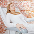 Woman relaxing in a salt cave