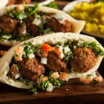 Pita filled with falafel and vegetables