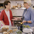 Woman talking to a dietitian in a kitchen