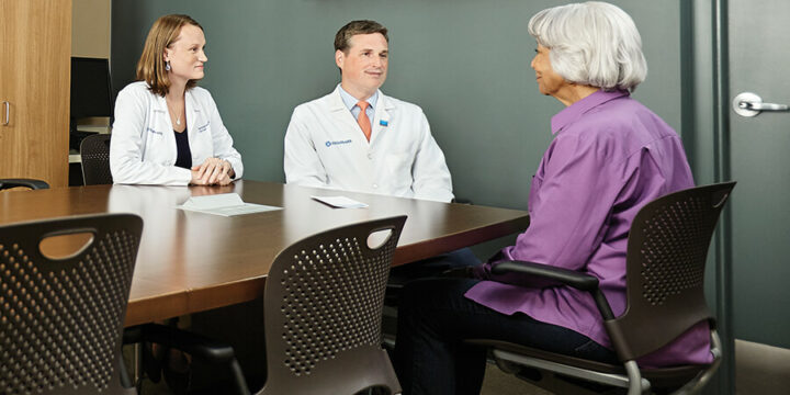 Person talking to two OhioHealth doctors