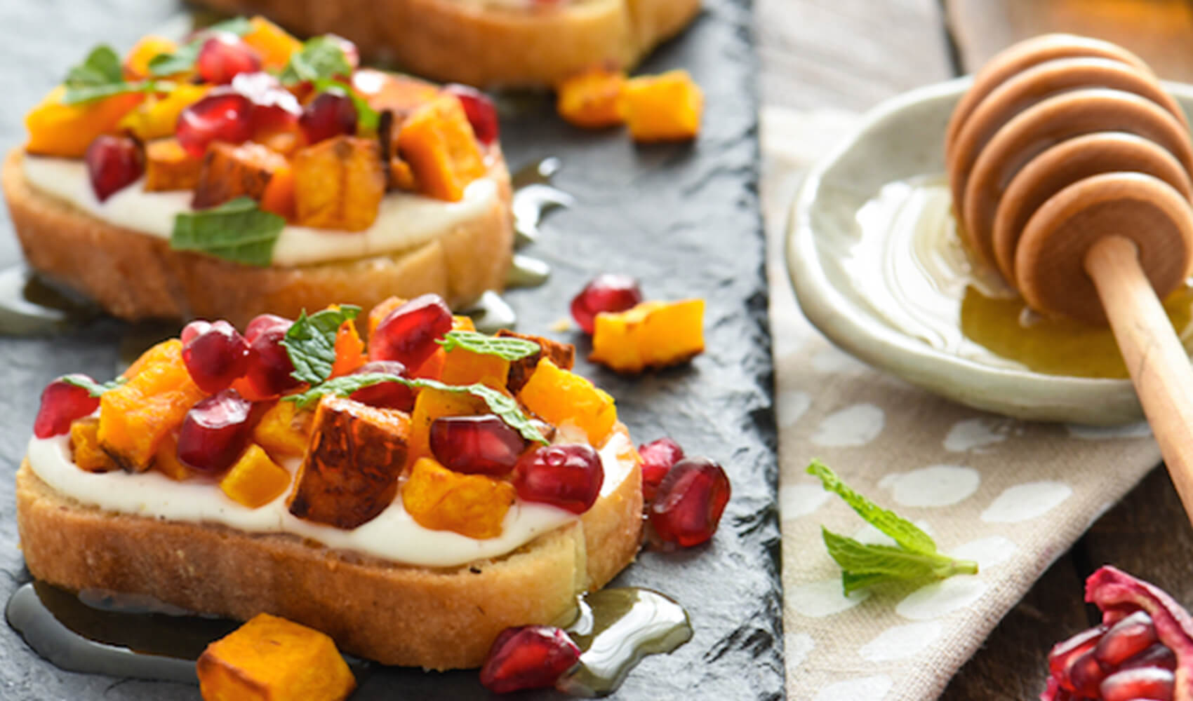 Butternut Squash & Pomegranate Crostini with Whipped Feta and Honey