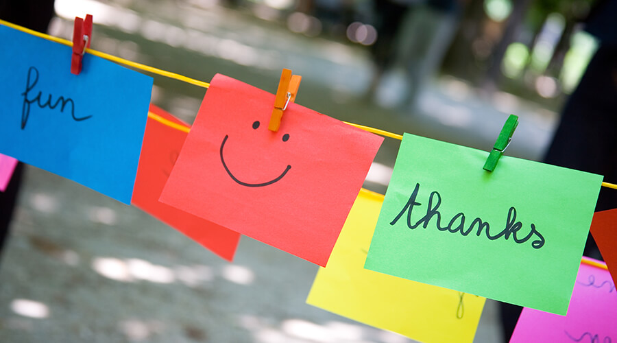 Strings hanging with notes clipped to them