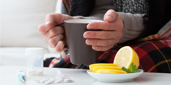 Person holding mug