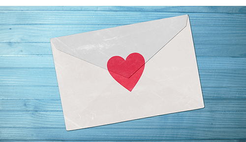 Envelope closed with red heart sticker