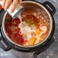 Liquid being poured into soup mixture in Instant Pot