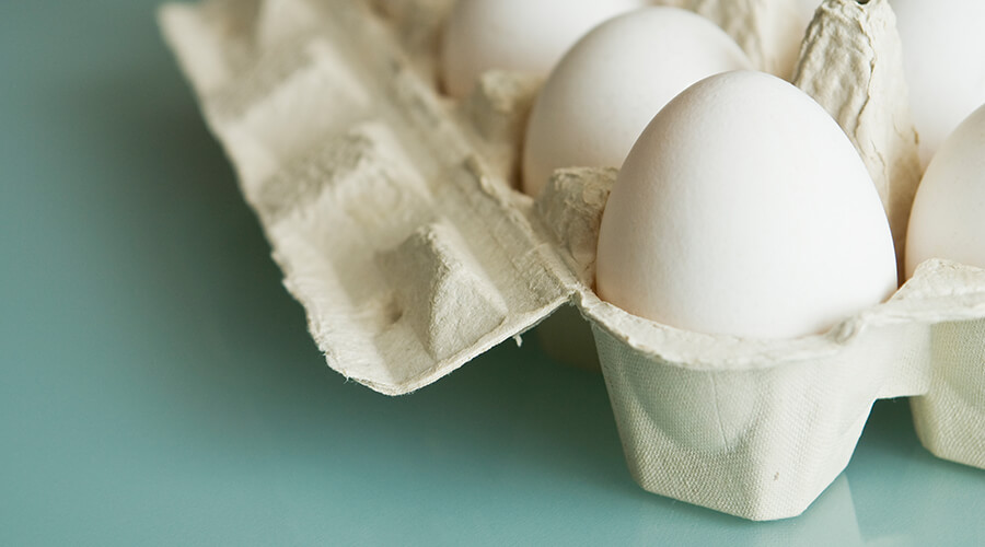 Carton full of white eggs Carton full of white eggs