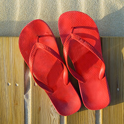 Pair of red flip flop sandals