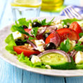Plate with mediterranean salad and vegetables