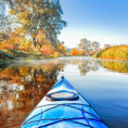 Kayak on river during fall