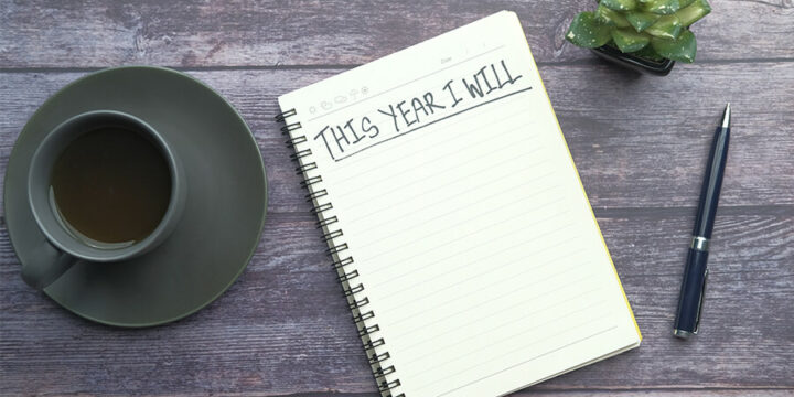 Closeup of goal journal that says This Year I will
