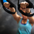 Person working out using TRX exercise equipment