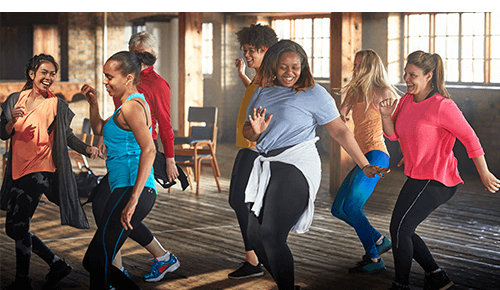 Group of women dancing in a workout class