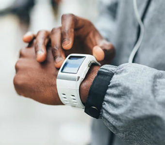 Closeup of person checking their smart watch