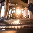 Closeup of a runners on a treadmill in a gym