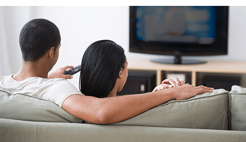Couple watching television