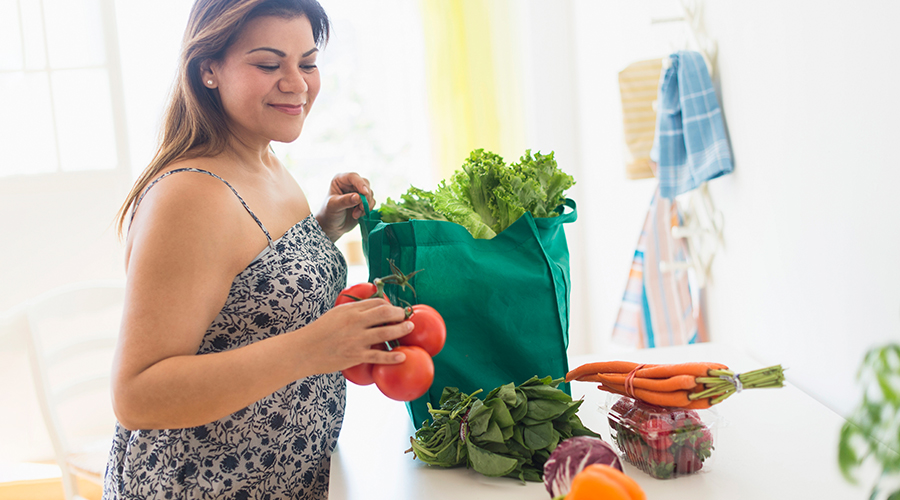 Woman unloading groceries