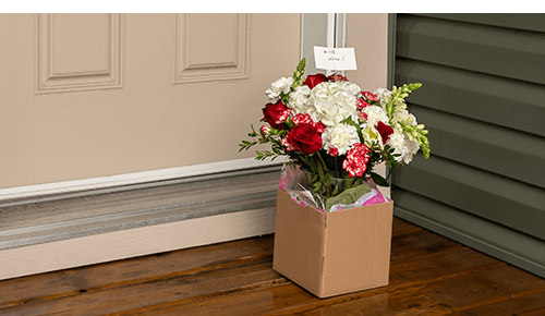 Box of flowers delivered to front door Box of flowers delivered to front door