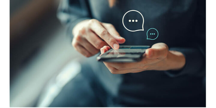 Person texting on mobile phone
