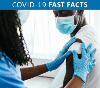Person receiving COVID-19 booster vaccine