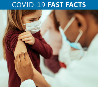 Child receiving COVID-19 vaccination