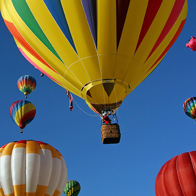 Hot air balloon festival, multiple hot air balloons flying