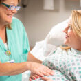 patient being comforted by nurse