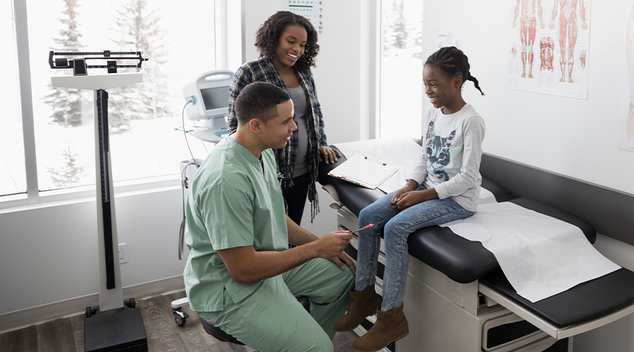 Child at the doctor with mother