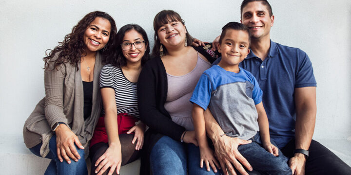 Hispanic family smiling together