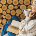Person reading a book in wintertime