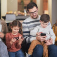 Family all on their mobile devices