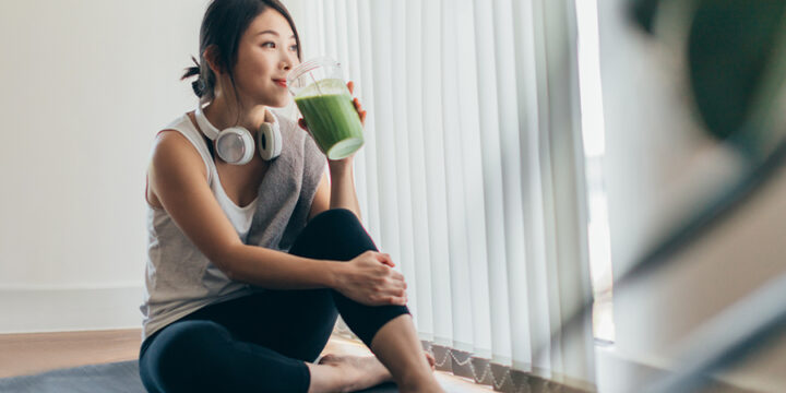 Woman having a smoothie after workout