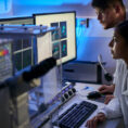 Two doctors in lab performing research