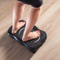 Person using a vibration plate