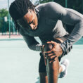 Man holding his knee in pain