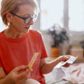 Woman looking at her perscription