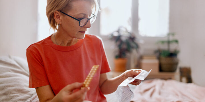 Woman looking at her perscription