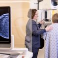 Women getting mammogram
