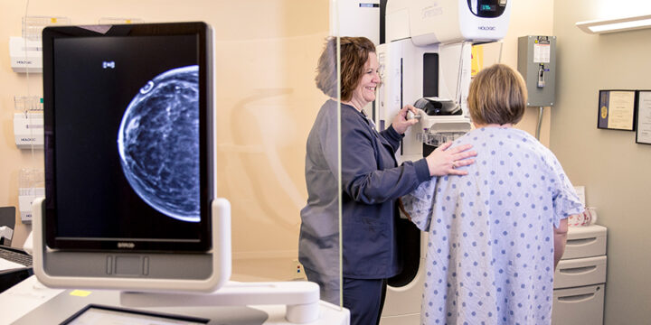 Women getting mammogram